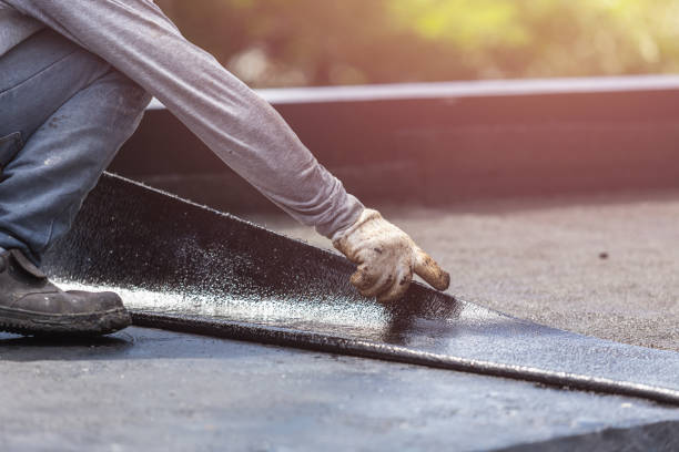 Professional Exterior Waterproofing technician working in Frankfort, MI